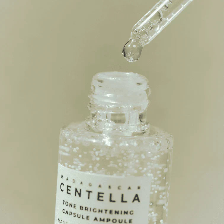 SKIN1004_MADAGASCAR_CENTELLA_TONE_BRIGHTENING_CAPSULE_AMPOULE_SKIN1004_-_Ampola_Iluminadora_com_C_psulas_de_Centella_Madagascar_100ml_skin1004_koumitwo